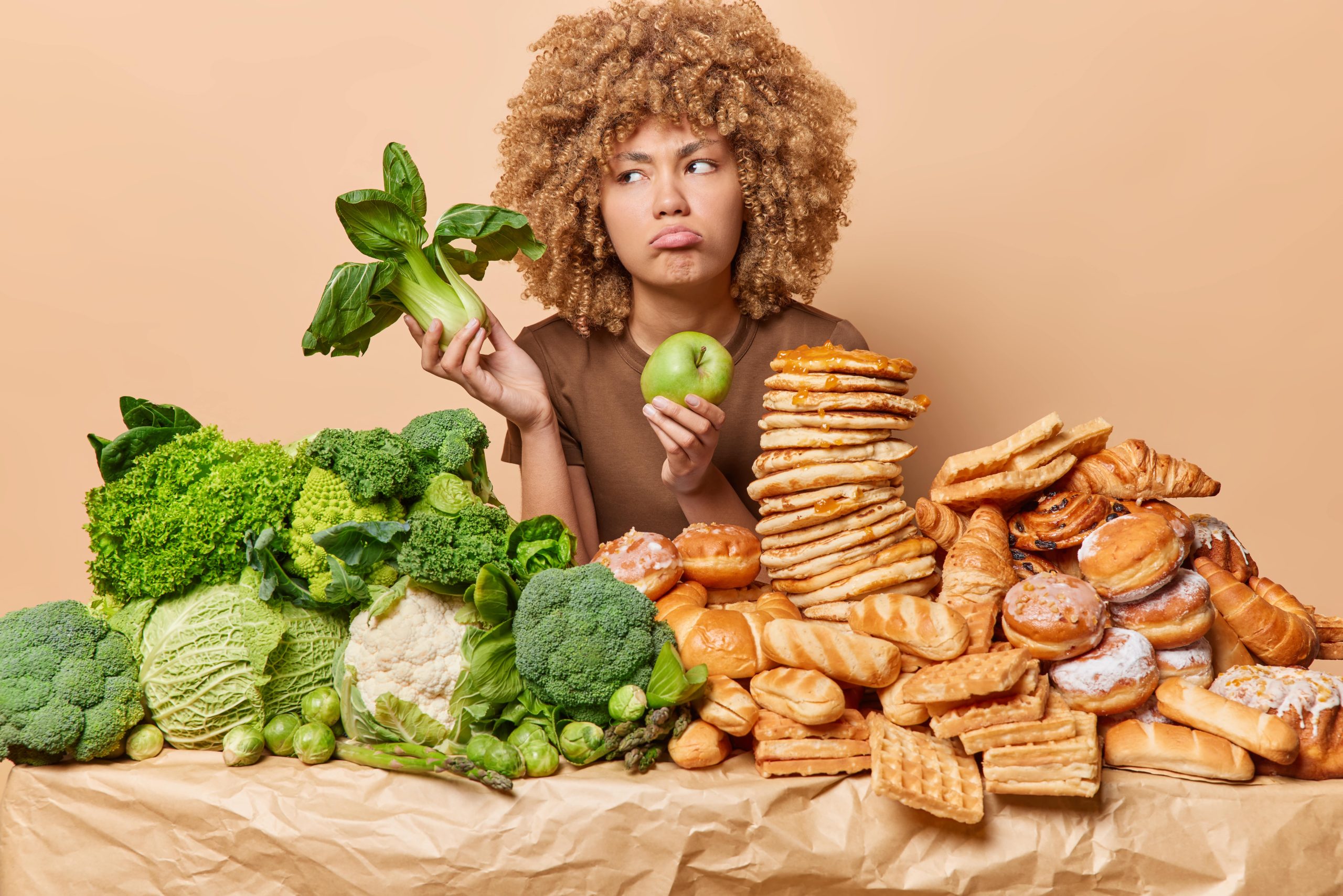 Illustration comparing a balanced meal with the outdated food pyramid, highlighting the importance of macronutrients, portion control, and nutrient-dense foods for optimal health.